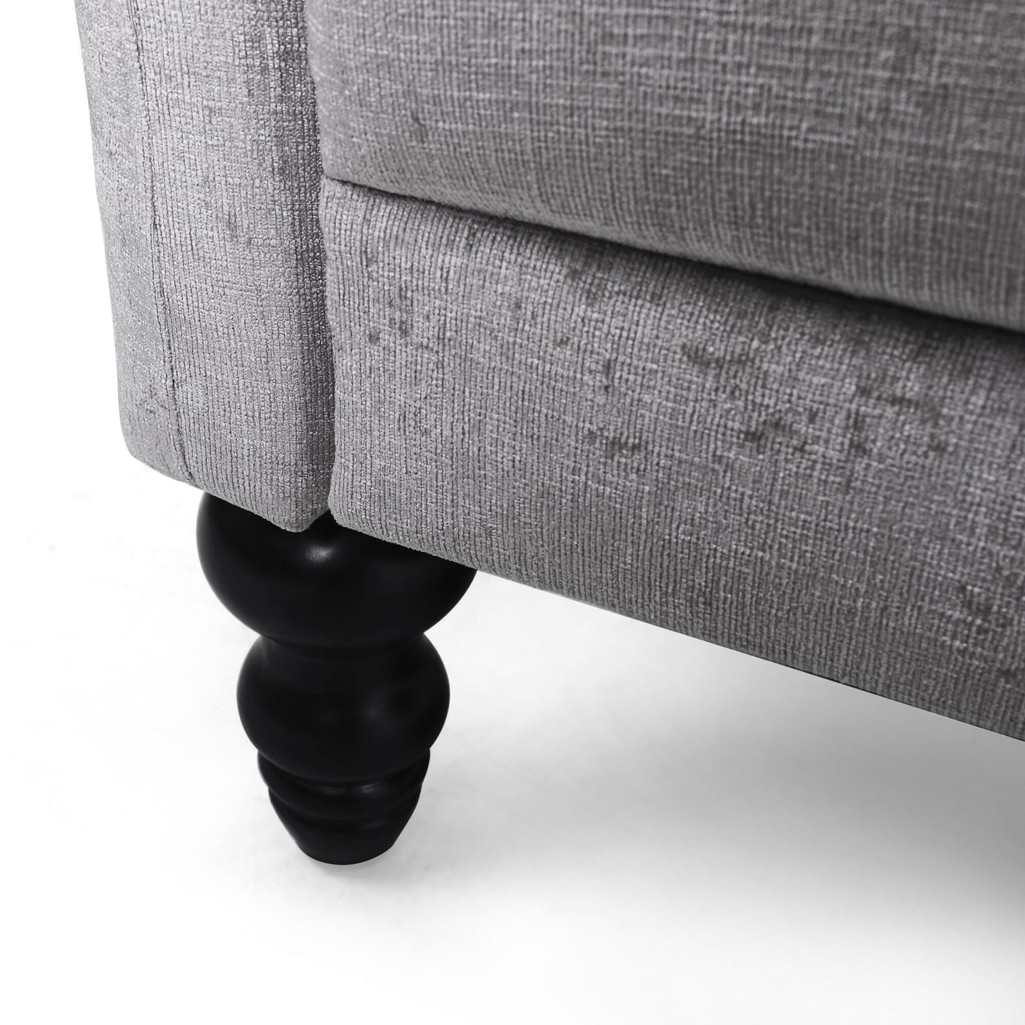 Divano a due posti in velluto con braccioli svasati e seduta profonda