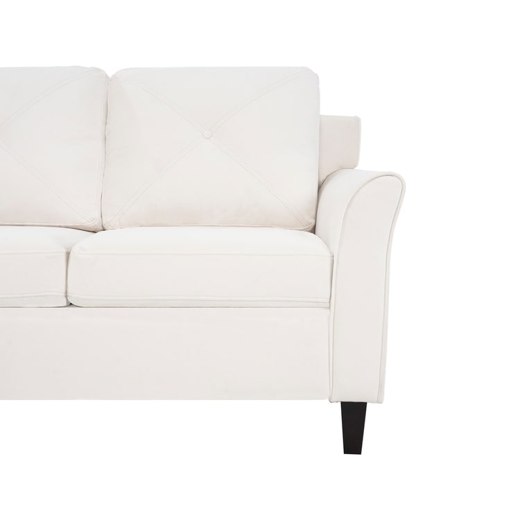 Elegante combinazione di divani: divano Chesterfield con braccioli arrotolati e braccioli svasati trapuntati con bottoni, divano in microfibra per piccoli spazi