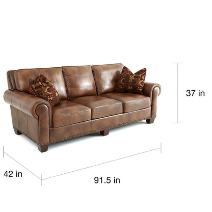 Divano Steve Silver Sanremo in pelle pieno fiore con finiture in borchie e cuscini decorativi