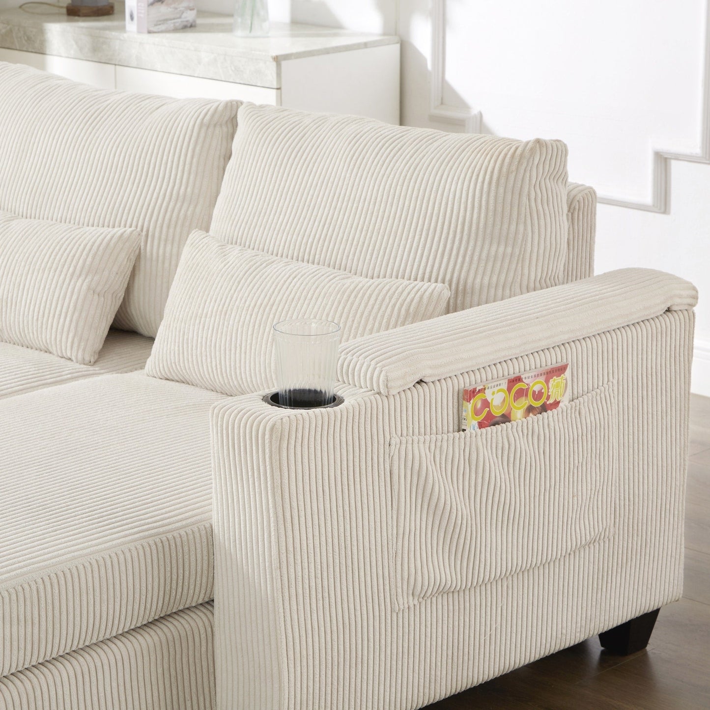 Divano letto in velluto a coste con porte USB