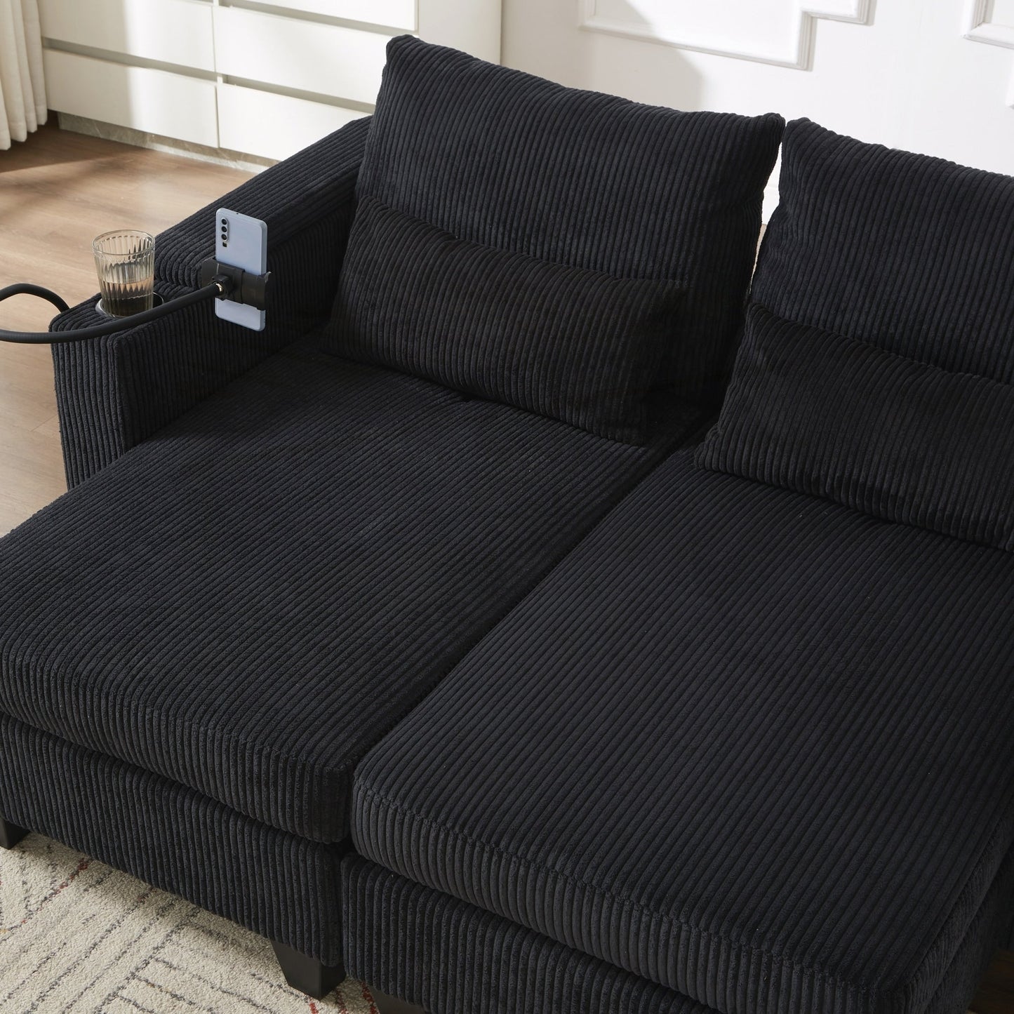 Divano letto in velluto a coste con porte USB