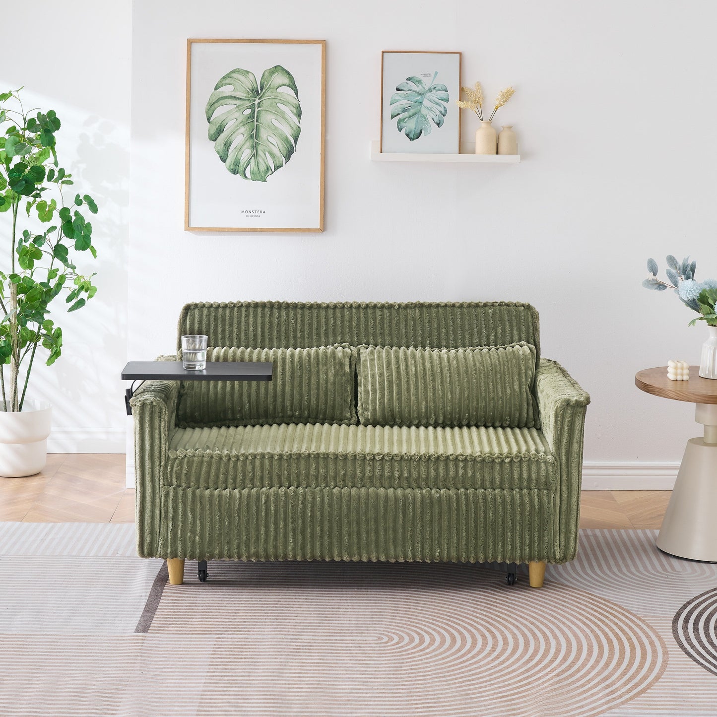 Divano in velluto a coste verde estraibile e removibile con doppia funzione, dotato di piano d'appoggio mobile e porte USB