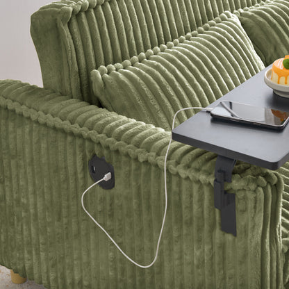 Divano in velluto a coste verde estraibile e removibile con doppia funzione, dotato di piano d'appoggio mobile e porte USB