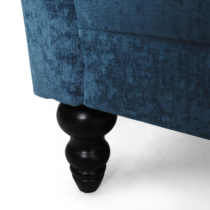 Divano a due posti in velluto con braccioli svasati e seduta profonda