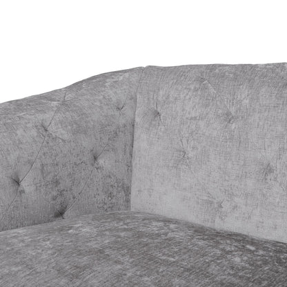 Divano a due posti in velluto con braccioli svasati e seduta profonda