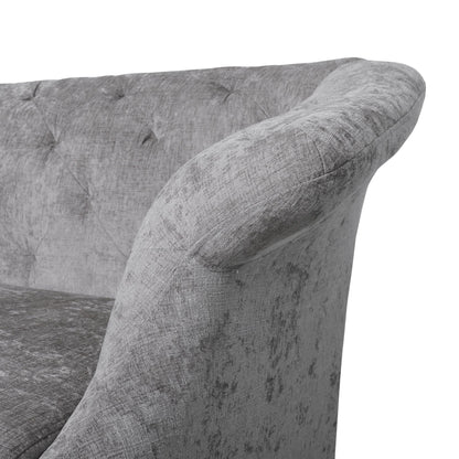 Divano a due posti in velluto con braccioli svasati e seduta profonda