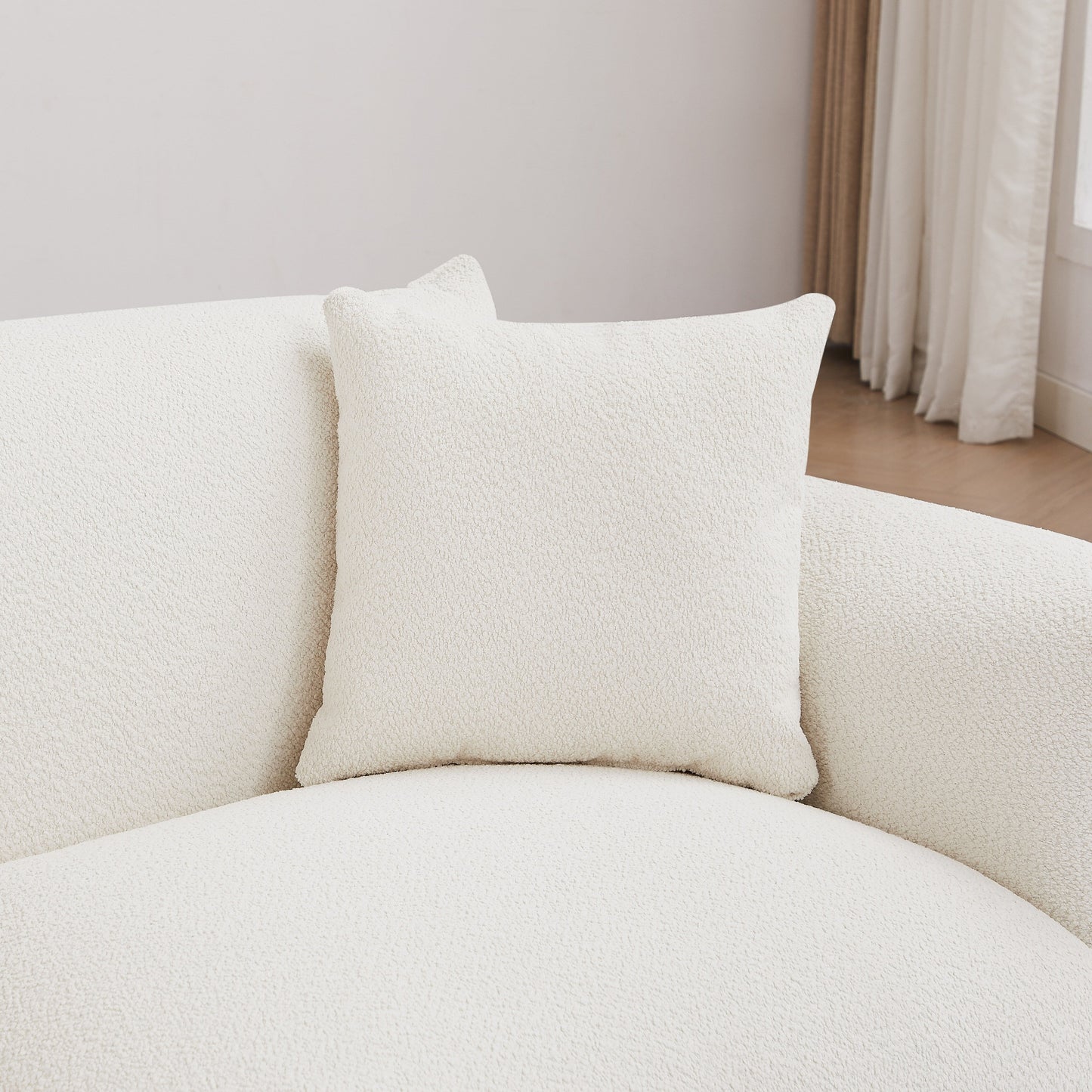 Divano bianco oversize a 3 posti con gambe in metallo