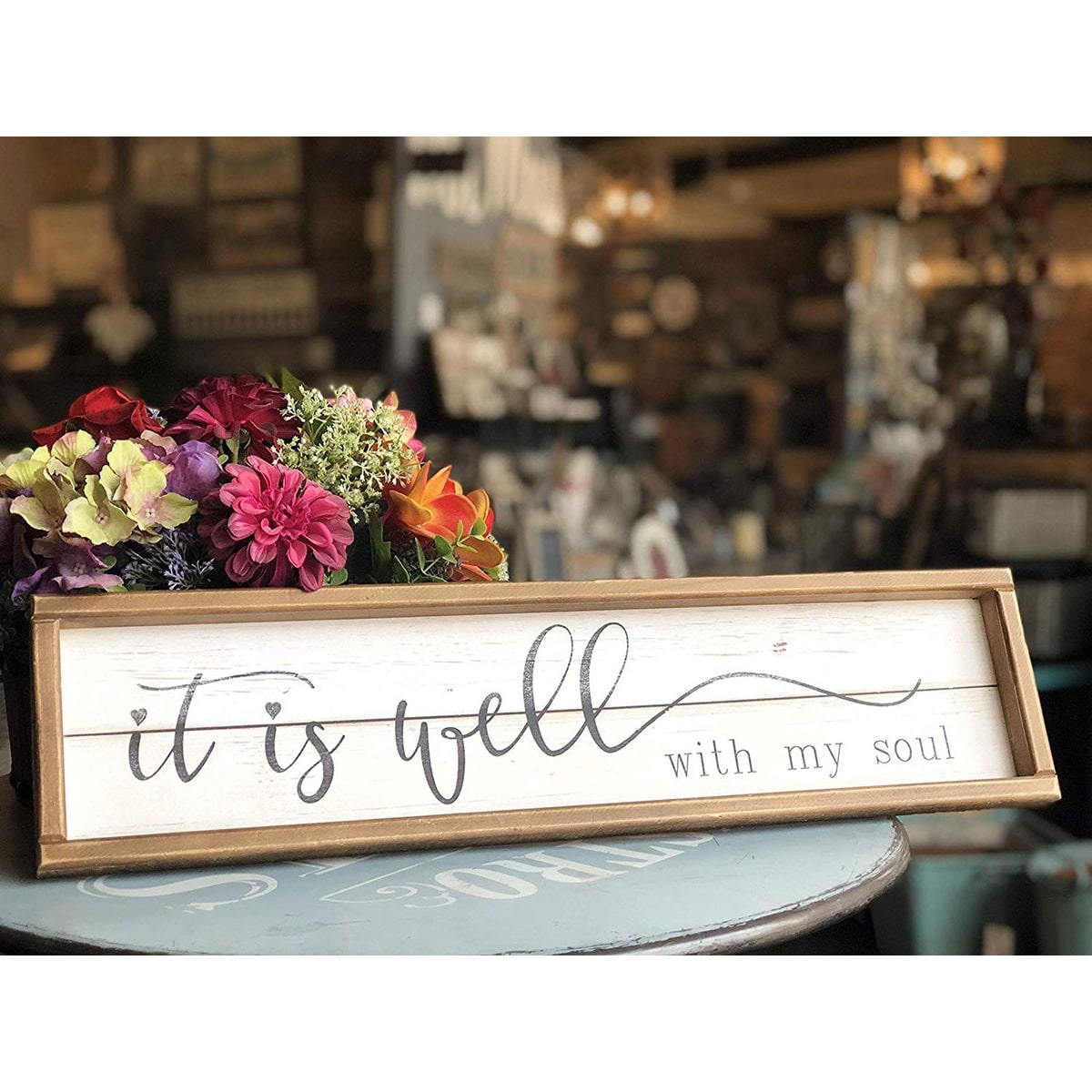 Decorazione da parete con cornice in legno e citazioni