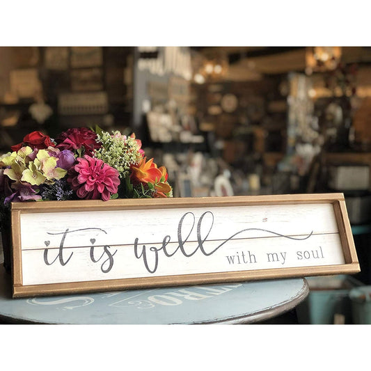 Decorazione da parete con cornice in legno e citazioni