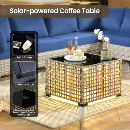 Set di mobili da giardino in rattan e vimini XIZZI da 11 pezzi con tavolo con braciere