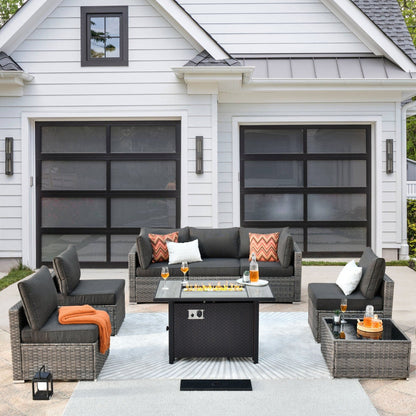 Set di mobili da giardino in vimini XIZZI da 8 pezzi con braciere