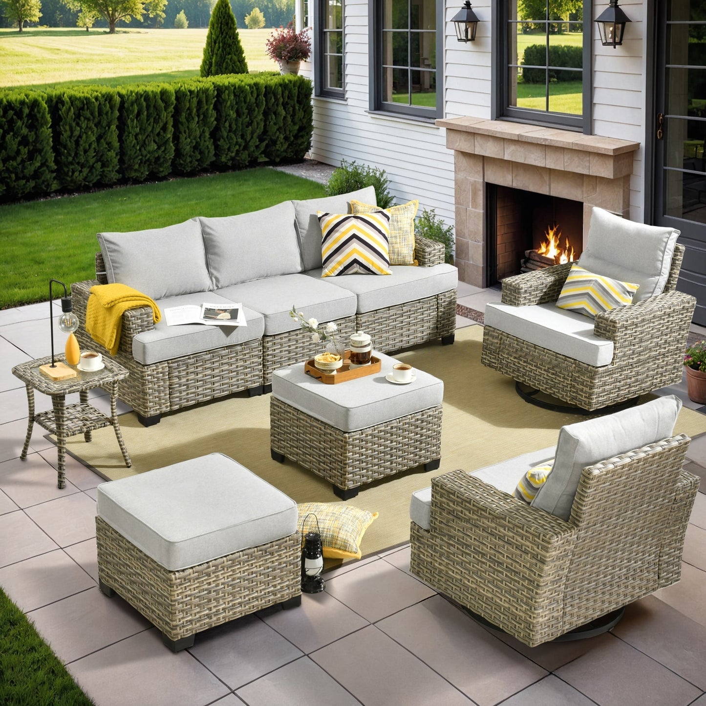 Set di mobili da giardino in vimini XIZZI da 8 pezzi con sedie girevoli