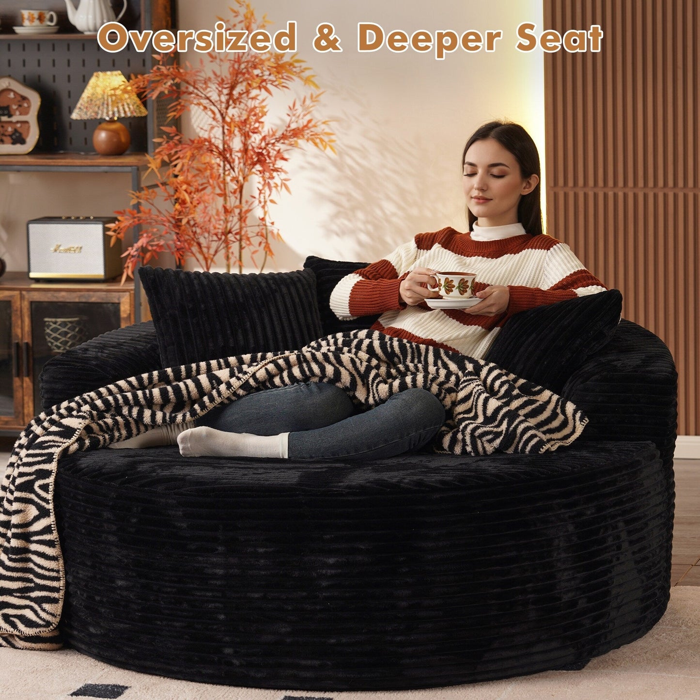 Divano moderno rotondo in peluche XIZZI con cuscini