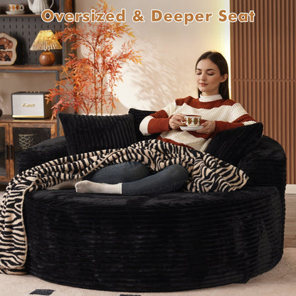 Divano moderno rotondo in peluche XIZZI con cuscini